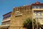 o berço da nação escrito na muralha da cidade